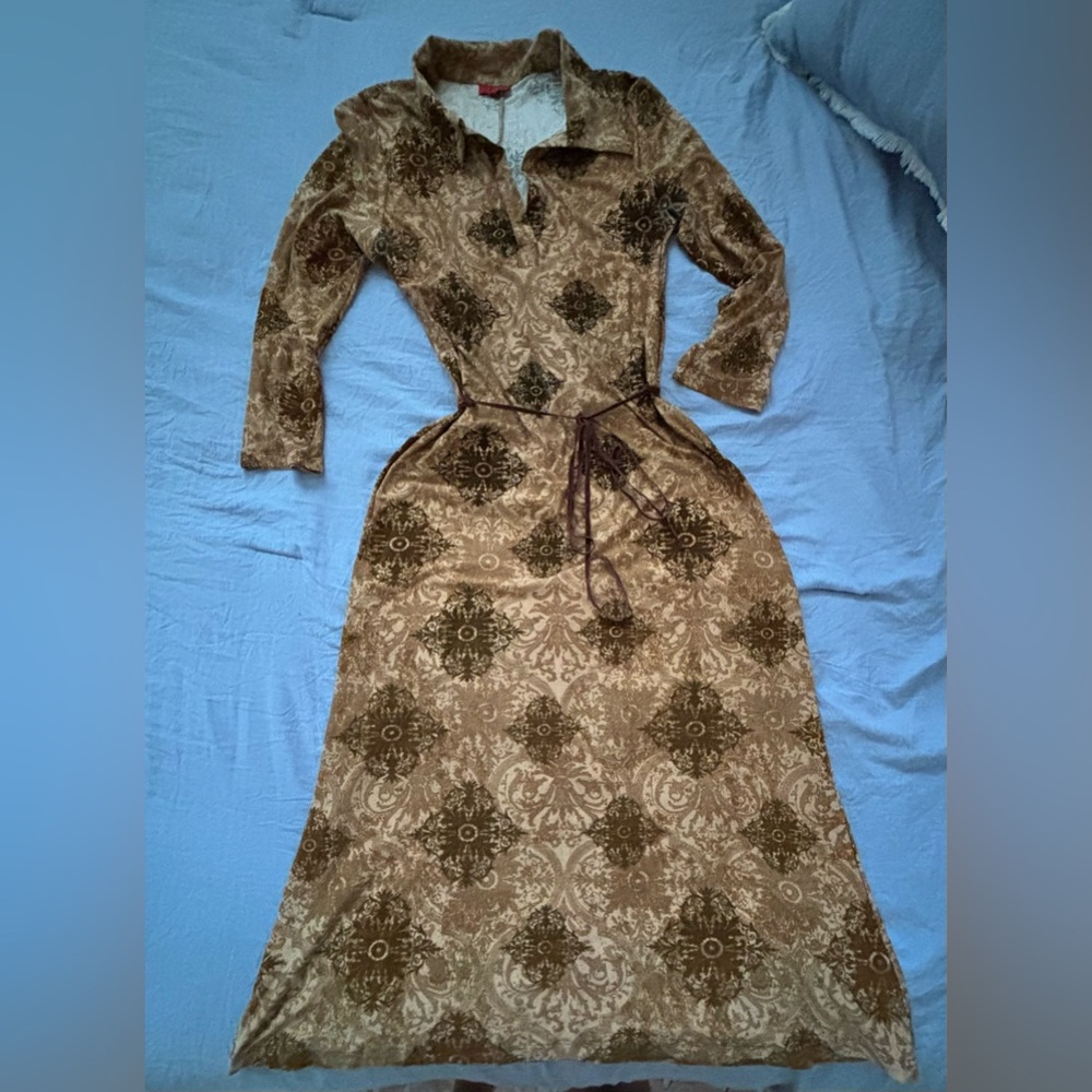 Traje de manga tres cuartos